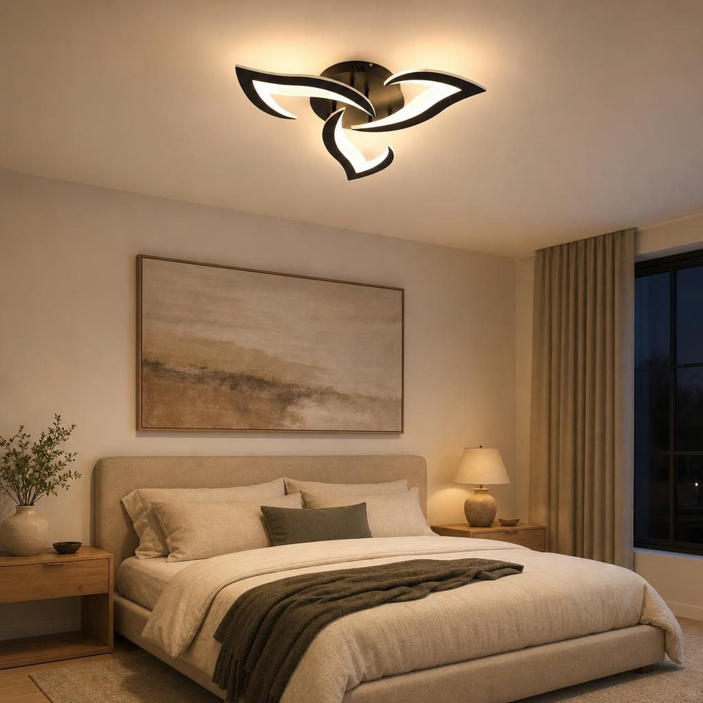 Plafonnier Pétales allumé au plafond d'une chambre moderne